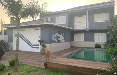 Casa sobrado de 2 dormitórios com suíte e piscina com aquecimento - moinhos de ventos, canoas