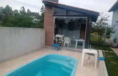 Casa - 3 dormitorios - 1 suite c/hidro, piscina e quiosque - praia de capão novo village