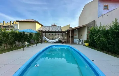 Casa de esquina com 2 terrenos com 5 quartos e piscina na praia de capão noo