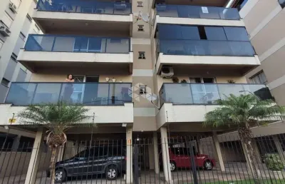 Apartemento semi mobiliado com 64 m²,  2 dormitórios, sacada,  living amplo,  vagas cobertas e elevador no centro de são leopoldo rs.