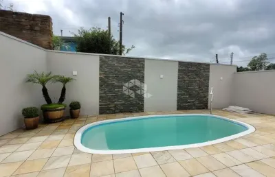 Sobrado no bairro primeiro de maio com 2 dormitórios, área gourmet com piscina.