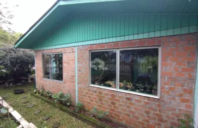 Casa em terreno de esquina localizada no bairro belvedere