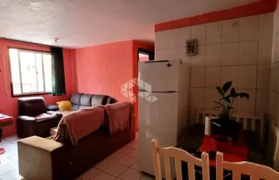 Apartamento terreio no cinquentenário, com dois quartos.