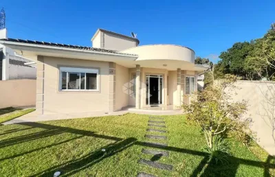 Casa mobiliada com 4 quartos, sendo 4 suítes, 4 vagas de garagem no bairro picadas do sul em são josé/sc.