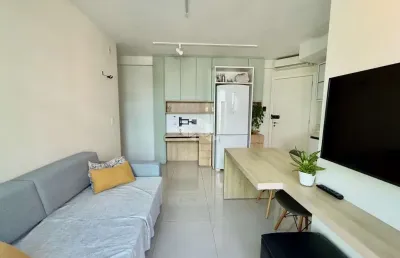 Apartamento semimobiliado com 2 quartos sendo 1 suíte e 1 vaga de garagem no bairro coqueiros em florianópolis/sc