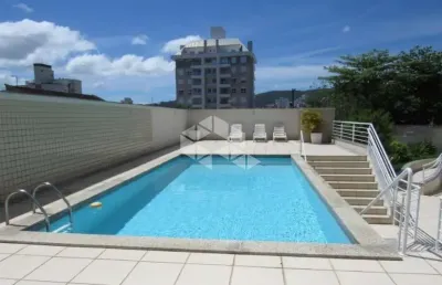 Apartamento 2 quartos 1 suíte 2 vagas e sacada com churrasqueira no bairro trindade florianópolis/sc