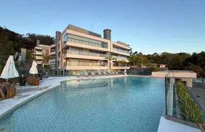 Apartamento com 3 suítes e 2 vagas de garagem em cacupé florianópolis/sc