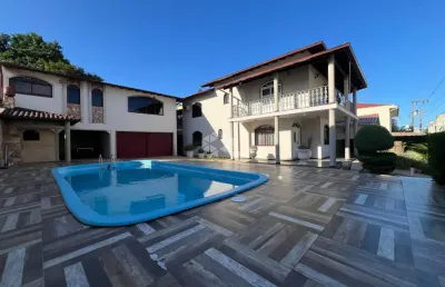Casa com 3 quartos sendo 1 suíte 2 vagas de garagem  e área gourmet completa  na praia comprida em são josé