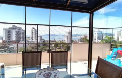 Cobertura com 3 quartos sendo 1 suíte vista mar e terraço no canto em florianópolis