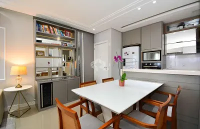 Apartamento com 2 quartos sendo 1 suíte semimobiliado sacada com churrasqueira e vista parcial do mar em barreiros são josé