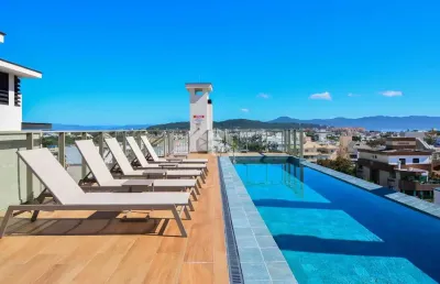 Studio com 2 suítes vaga de garagem sacada com churrasqueira e vista panorâmica em jurerê internacional