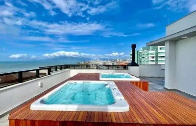 Apartamento com 3 quartos sendo 2 suítes e vagas de garagem em coqueiros florianópolis
