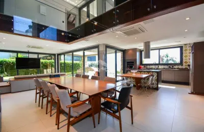 Casa 4 suítes no cacupé florianópolis com piscina vista para o mar e 5 vagas de garagem