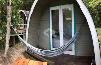 Terreno à venda em garopaba com 4 cabanas no morro da encantada