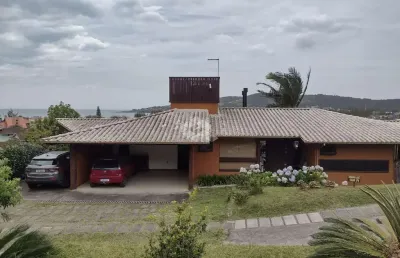 Casa com 5 quartos, 3 vagas e 225 m² privativos no condomínio mar azul - bairro morrinhos - garopaba sc