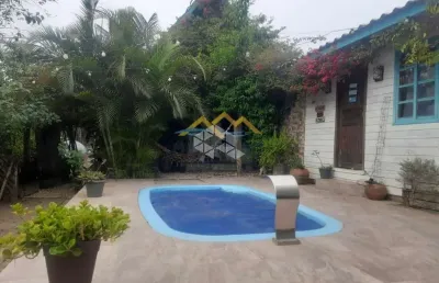 Casa com 4 quartos, 2 vagas, 336,55m² de área total na praia do rosa - imbituba sc