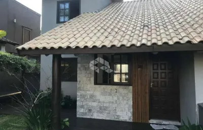 Casa com 2 dormitórios,  1 vaga, 180 m² no bairro jardim panorâmico em garopaba sc