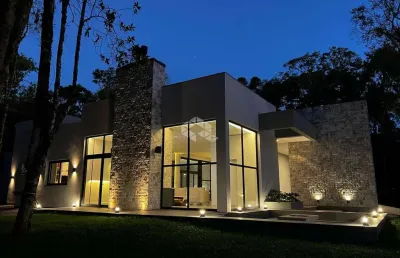 Casa 3 dormitórios, 420m ² privativos, no condomínio fechado golf club em gramado
