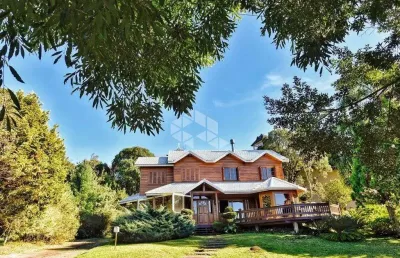 Crédito real gramado vende belíssima casa com 4 dormitórios