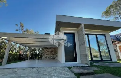 Casa com 3 suítes, 200 m2 privativos, no loteamento terras altas em gramado
