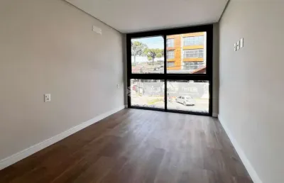 Apartamento novo, 1 dormitório + lavabo, com 54,49m² privativos, 1 box, no centro de canela