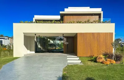 Casa de alto padrão em condomínio fechado à venda em eldorado do sul/rs - 4 suítes e 2 vagas