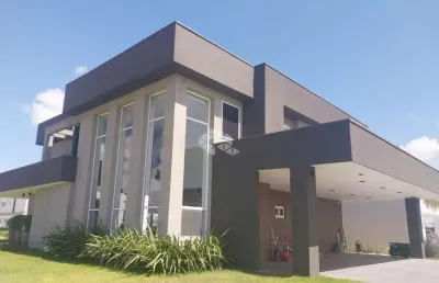 Casa de alto padrão à venda, com 4 suítes, 4 vagas, em condomínio fechado, eldorado do sul/rs