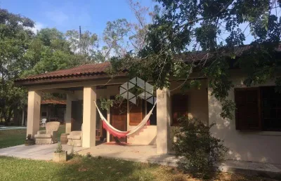 Sítio no guaíba country clube - com casa, piscina e muita área arborizada - parque eldorado