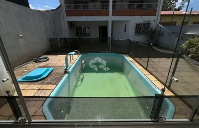 Casa à venda com 3 quartos e 2 vagas no centro de guaíba