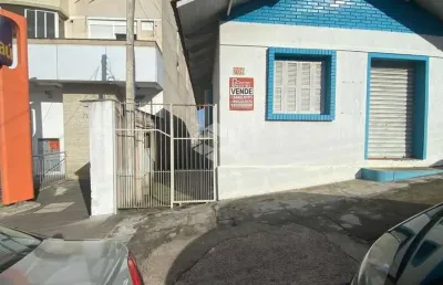 Ótimo ponto comercial à venda no centro de guaiba. nos fundos casa 1 dormitório.