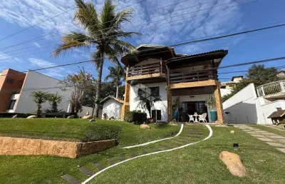 Casa de alto padrão  a venda no condomínio aruã em arujá com 4 suites