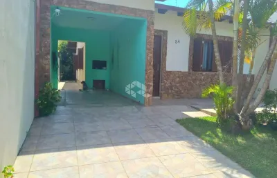 Casa térrea 3 dormitórios com churrasqueira e garagem bairro igara canoas/rs.