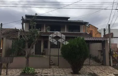 Casa 4 dormitórios sendo uma suíte e 4 vagas bairro monhos de vento, canoas/rs.