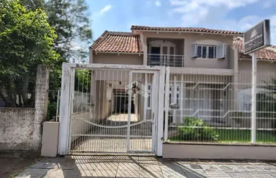 Sobrado 254m² 05 dormitórios, 05 vagas no bairro nossa senhora das graças em canoas