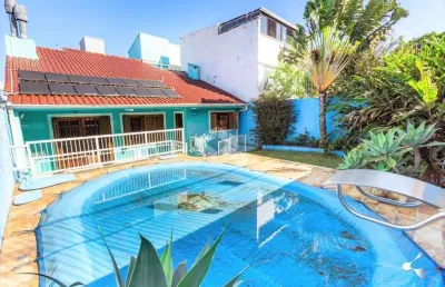 Casa em condomínio fechado com 4 quartos à venda na Rua Presidente Juarez, 510, São Sebastião, Porto Alegre