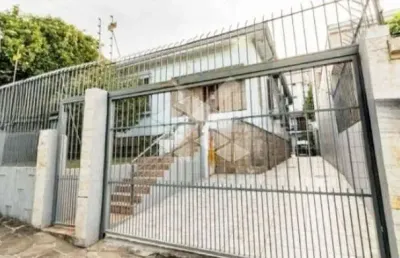 Casa à venda com 5 quartos, 4 banheiros,  5 vagas de garagem, piscina, no bairro santo antônio, poa/rs