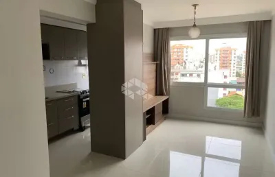 Apartamento com dois dormitórios e vaga de garagem em porto alegre.