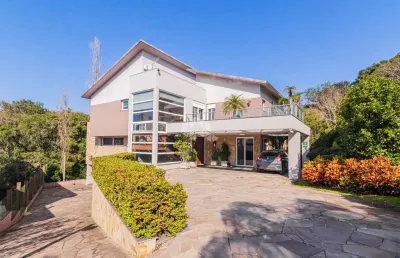 Casa em condomínio fechado com 4 quartos à venda na Avenida Bento Gonçalves, 8083, Agronomia, Porto Alegre