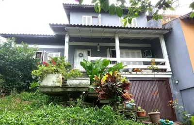 Casa com 5 quartos  à  venda, vila nova, porto alegre.