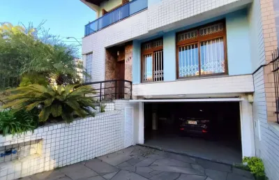 Casa com 3 quartos à venda na Rua Filipinas, 140, Jardim Lindóia, Porto Alegre