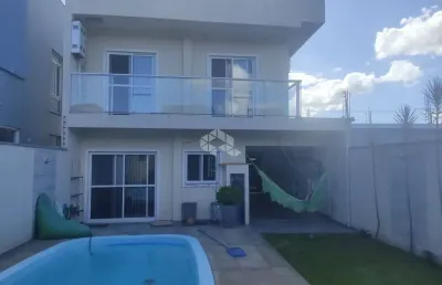 Casa/sobrado à venda, com piscina, lareira, 2 vagas cobertas, 3 quartos em eldorado do sul/rs