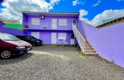 Prédio residencial com 4 apartamentos amplos, no bairro sarandi, em porto alegre.