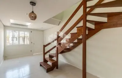 Casa em condomínio com 2 dormitórios e 1 vaga de garagem, no bairro rio branco, em canoas.