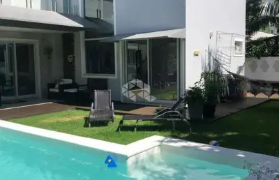 Casa 5 suítes ,600 metros da praia ,cachoeira do bom jesus. florianópolis/sc