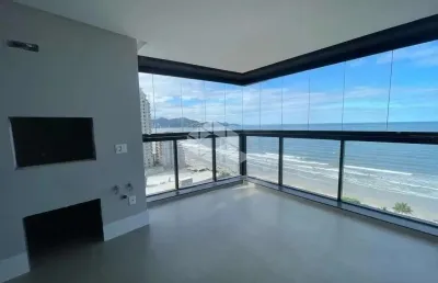 Apartamento com 4 suítes, 3 vagas de garagem na meia praia