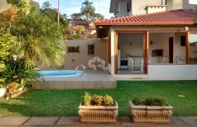 Linda casa em ivoti, localizada no bairro jardim do alto, com 204m² de área construída em um terreno de 12x8x39m