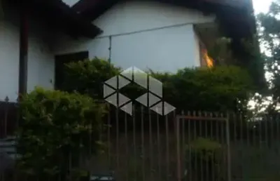 Casa com 4 quartos à venda na Rua Teixeira de Carvalho, 55, Medianeira, Porto Alegre