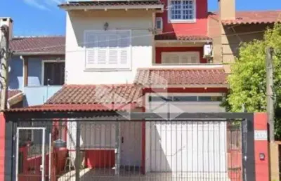 Casa com 3 quartos à venda na Rua Baldoino Bottini, 613, Hípica, Porto Alegre