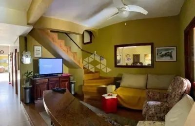Casa em condomínio fechado com 3 quartos à venda na Rua Vacaria, 115, Hípica, Porto Alegre