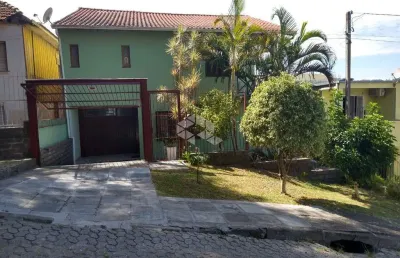 Casa com 4 quartos à venda na Rua Marieta, 257, Partenon, Porto Alegre